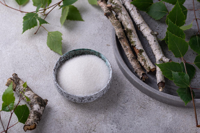 Ksilitolis ir cukrus: kas draugas, o kas priešas dantims?