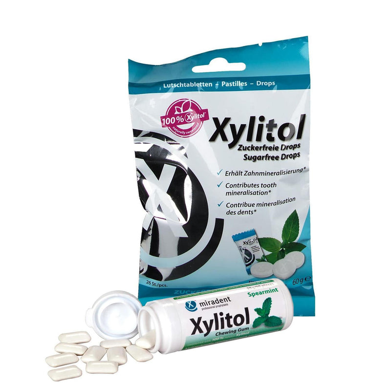 "Miradent Xylitol" pastilių (26 vnt.) ir becukrės kramtomosios gumos su ksilitoliu (30 vnt.) komplektas